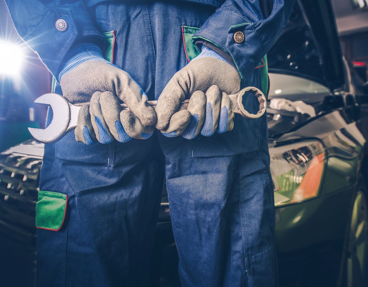 Car Mechanic doing a Car Service - Car Servicing Plympton