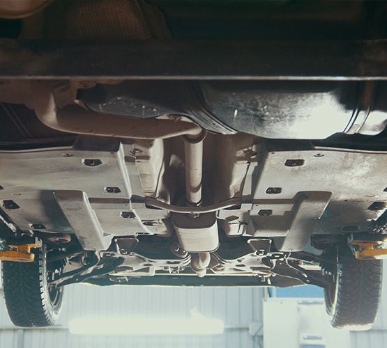 Mechanic performing diagnostics on a car - Car Repairs Plympton