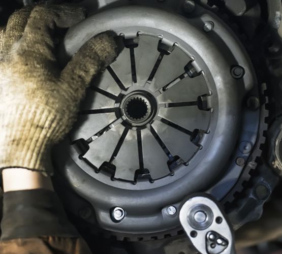 Mechanic performing diagnostics on a car - Car Repairs Plympton